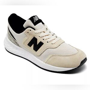 New Balance Women's Fresh Foam X70 sneaker in off-white/black with leopard print